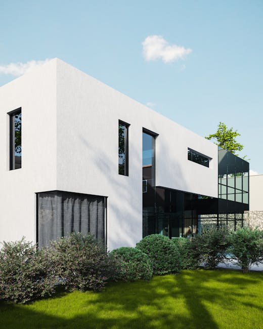 Modern white house with large windows and greenery.